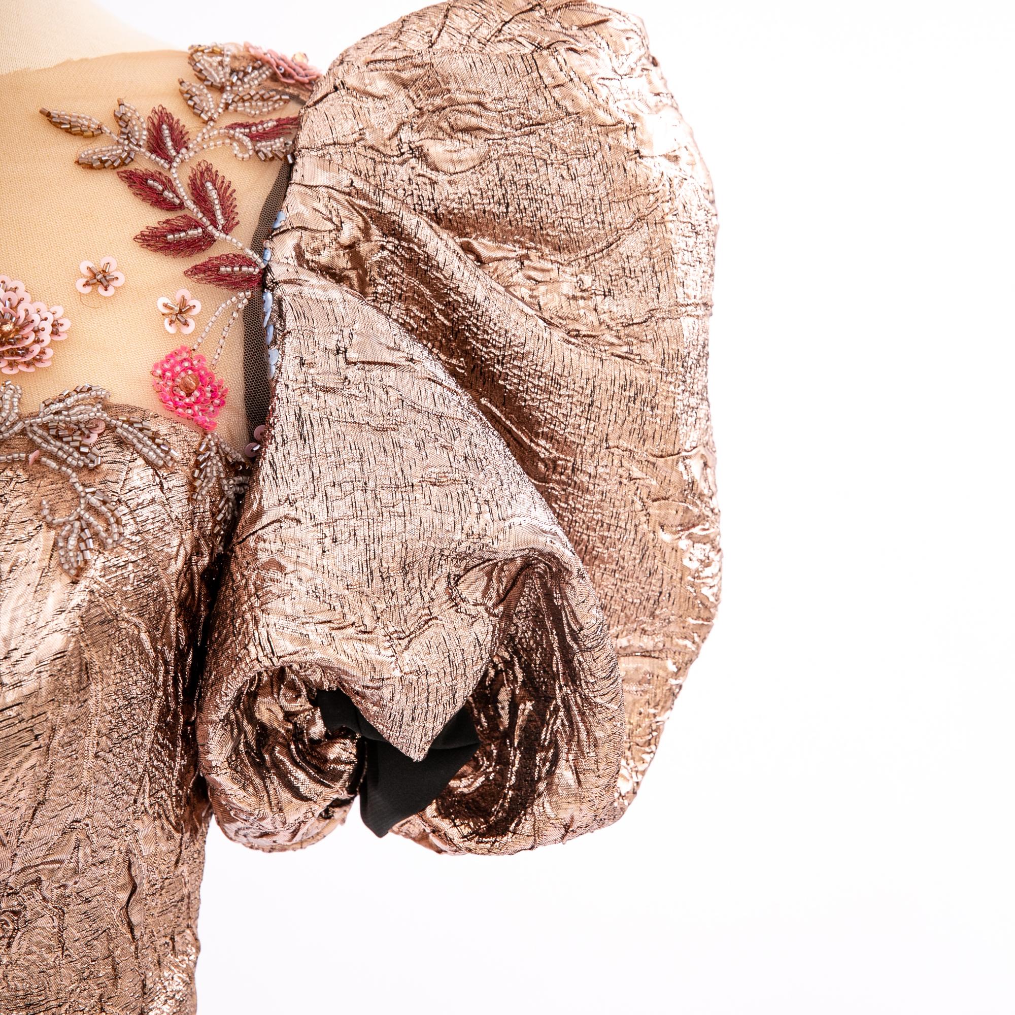 Delicate floral embroidery on silk scarf